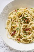 Spaghetti with chillies and herbs (overhead view)