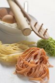 Home-made coloured pasta with ingredients