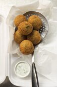 Falafel (chick-pea balls) with yoghurt dip in lunch box