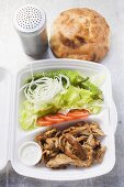 Döner kebab with salad in lunch box