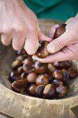 Cutting a slit in chestnuts