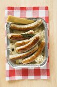 Sausages with sauerkraut and mustard to take away