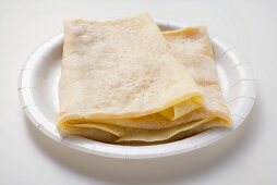 Crêpes on paper plate