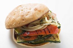 Toasted roll filled with grilled vegetables