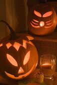 Pumpkin lanterns, cupcake and drink for Halloween