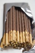 Chocolate sticks in opened packaging