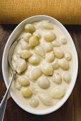 Pearl onions in cream sauce (overhead view)