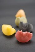 Coloured lumaconi (pasta shells)