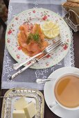 Smoked salmon, tea, butter and toast