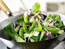 Green vegetables in wok