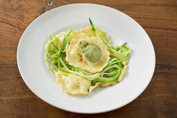 Ravioli with courgette laces