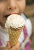 Child eating an ice cream cone