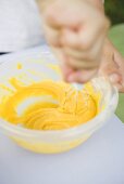 Mixing flour and egg yolks
