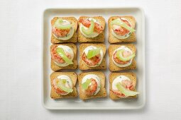 Herb quark, shrimps and celery on toasts