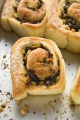 Savoury pinwheels with pesto and pine nuts