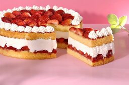 Strawberry cake, a piece cut