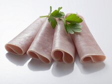 Ham rolls garnished with parsley