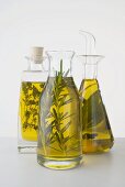 Three different herb oils in bottles