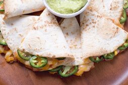 Tortillas with chilli and cheese filling, guacamole