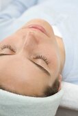 Woman, lying down, before beauty treatment