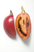 Two wedges of tamarillo (overhead view)