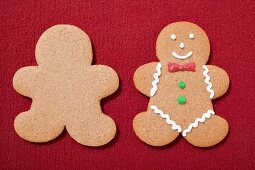 Two gingerbread men, plain and decorated