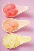 Jelly sweets on three spoons