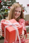 Woman holding Christmas parcel