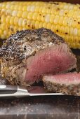 Peppered steak with corn on the cob
