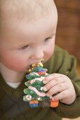 Baby eating jelly Christmas tree