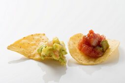 Guacamole on nacho, salsa on tortilla chip