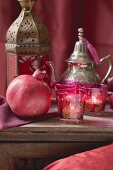 Middle Eastern decorations: pomegranate, windlights, teapot