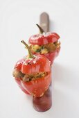 Two peppers with bread and mushroom stuffing