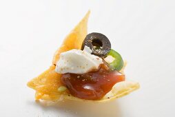 Nacho with cheese, olive, chilli ring, ketchup & sour cream