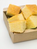 Cubes of cornbread in cardboard box