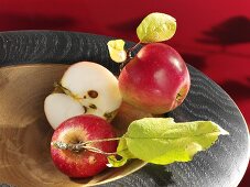 Fresh McIntosh apples in wooden bowl