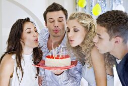 Young people celebrating a birthday