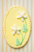 Easter biscuit decorated with narcissi