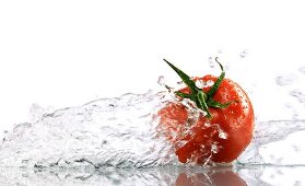 A tomato surrounded with water