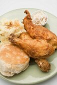 Chicken with mashed potato, biscuit (scone) and coleslaw