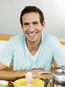 Man sitting at breakfast table