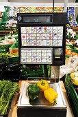 Germany, bell pepper on supermarket scale, close-up, elevated view