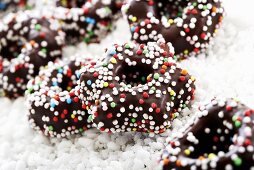 Chocolate fondant rings with sprinkles (tree ornaments)