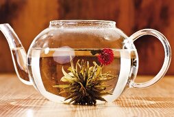 Tea flower in glass teapot