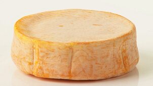 A whole washed rind cheese