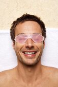 Man in gel eye mask