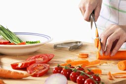 Man chopping carrots, close-up