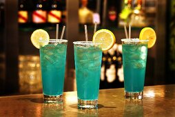 Blue Crush cocktails with rum on bar