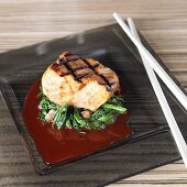 Grilled salmon fillet with greens, achiote and ponzu sauce