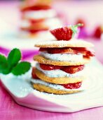 Close-up of strawberry tower with poppy seed cream